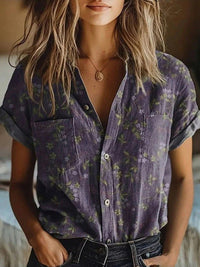 Camilla | Elegante Bluse mit Blumenmuster, Knopfleiste und kurzen Ärmeln